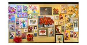 wall of flower paintings